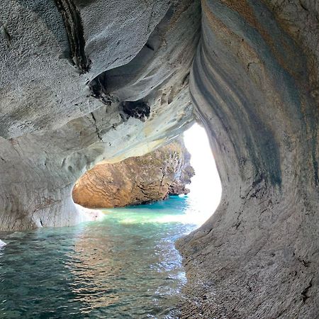 Cabana Cavernas Austral Puerto Sanchez Villa Bagian luar foto